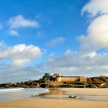 Load image into Gallery viewer, Golden sand and blue sky of Corblets beach in Alderney