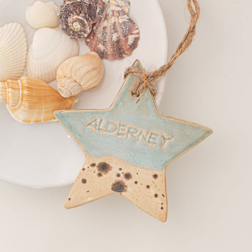Island Aura hanging Alderney ceramic star with a coastal glaze