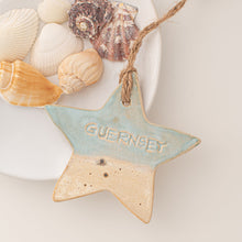 Load image into Gallery viewer, Island Aura hanging Guernsey ceramic star with a coastal glaze
