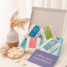 Load image into Gallery viewer, Island Aura wax melts letterbox gift with Guernsey postcard
